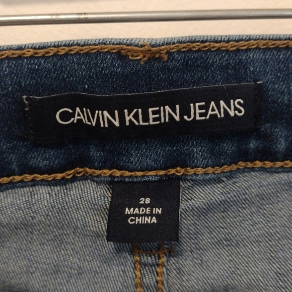 Calvin Klein - Distressed Mid Rise Skinny Jeans - Picture 11 of 15